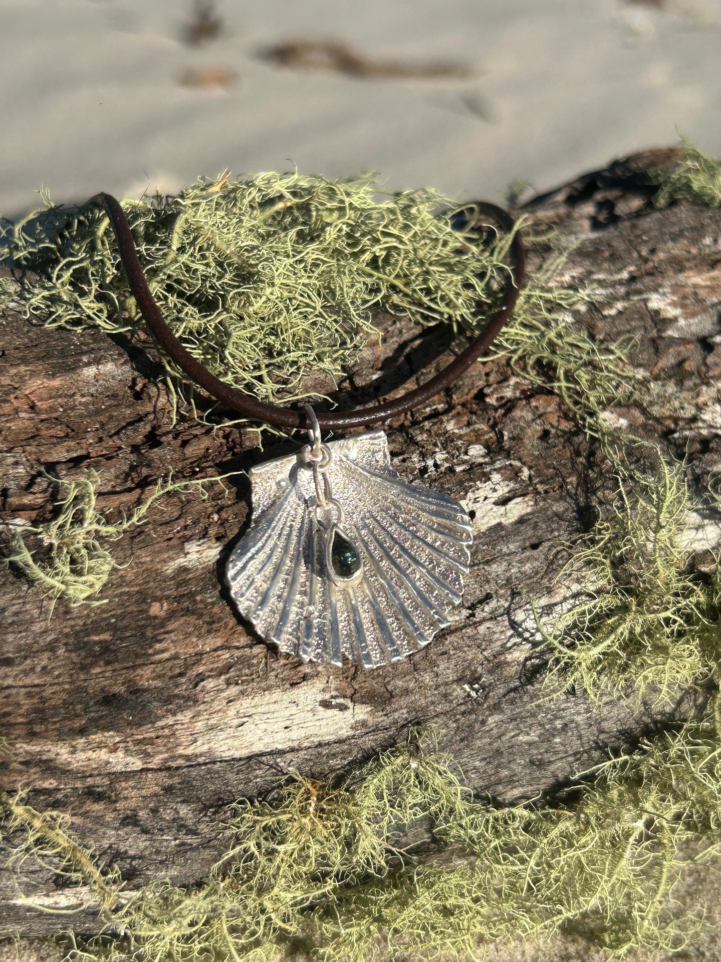 Aphrodite's Sapphire Seashell Pendant
